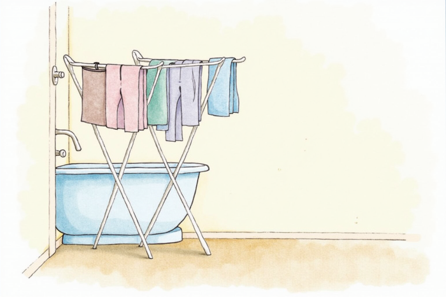 Folding drying rack with clothes in small bathroom